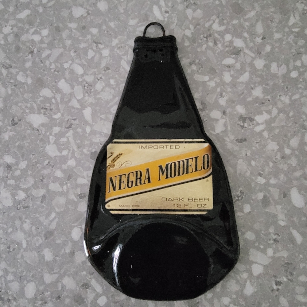 Negra Modelo flattened glass beer bottle art, with hanger.